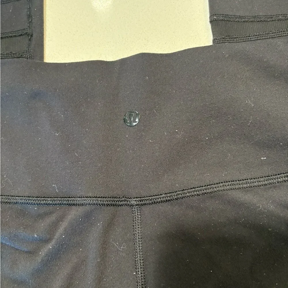 Lululemon black mesh leggings (flawed) size 4. - Picture 3 of 9